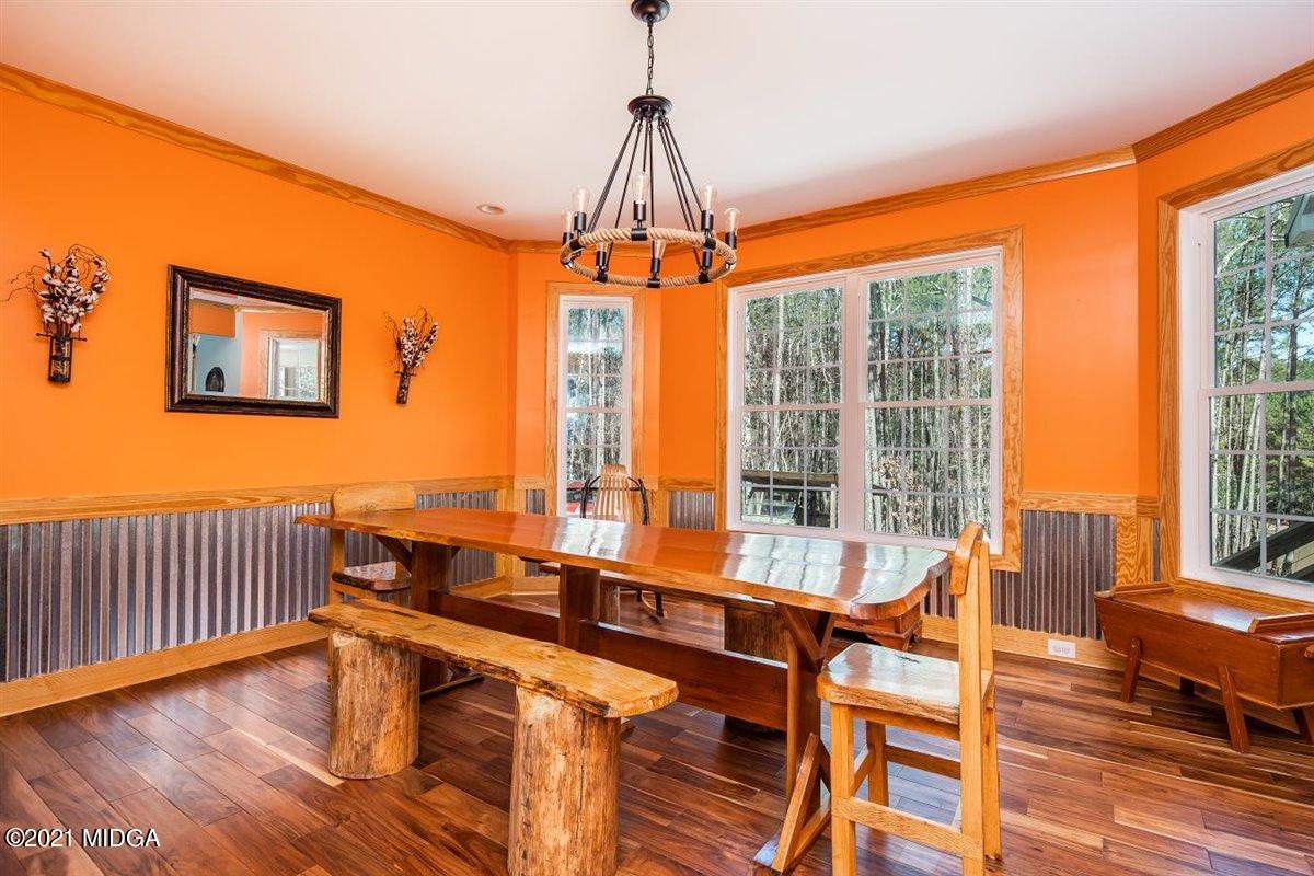 725 Taylor Road Juliette, GA 31046 - Photo 22 of 62 a very nice looking room with a large window and furniture