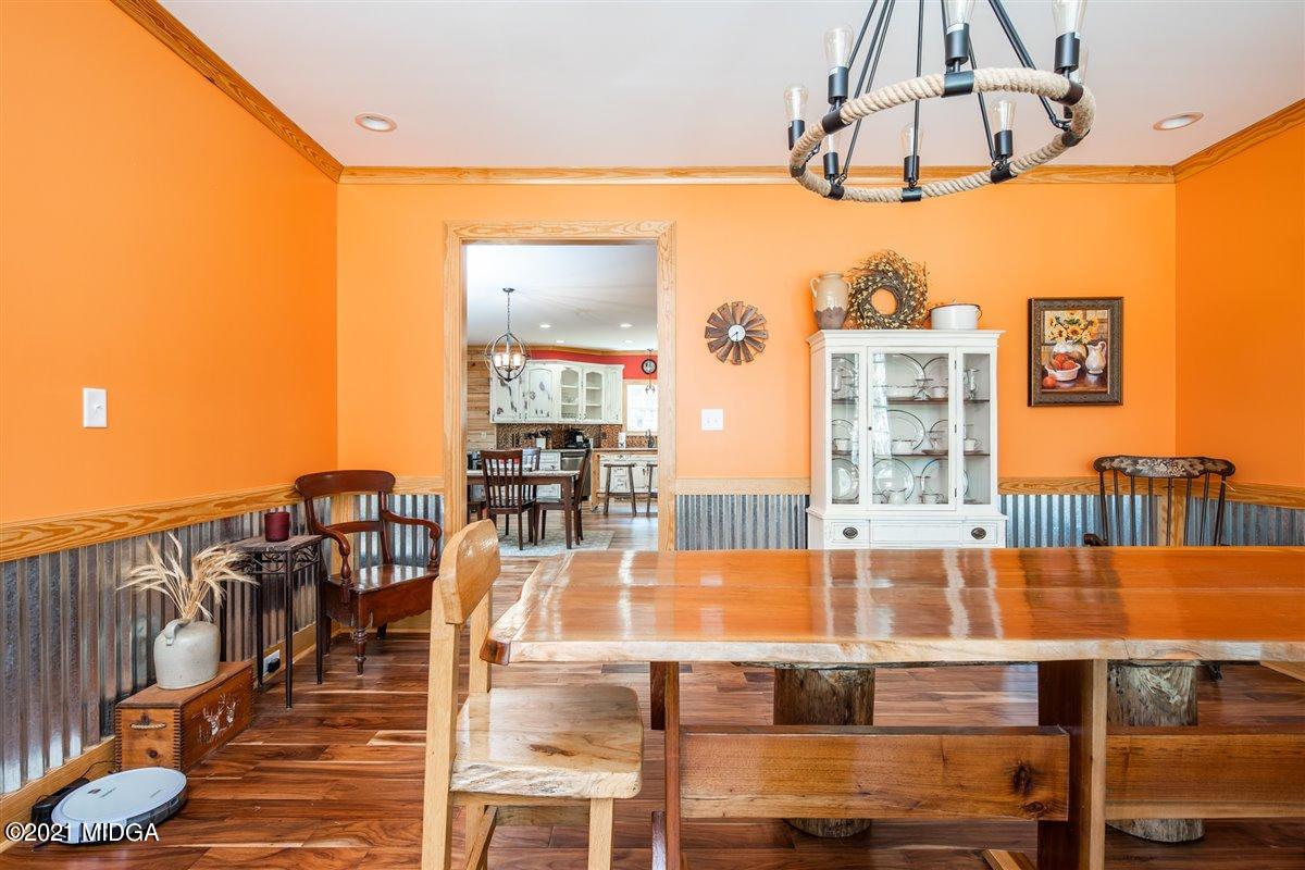 725 Taylor Road Juliette, GA 31046 - Photo 23 of 62 a view of a living room and dining room
