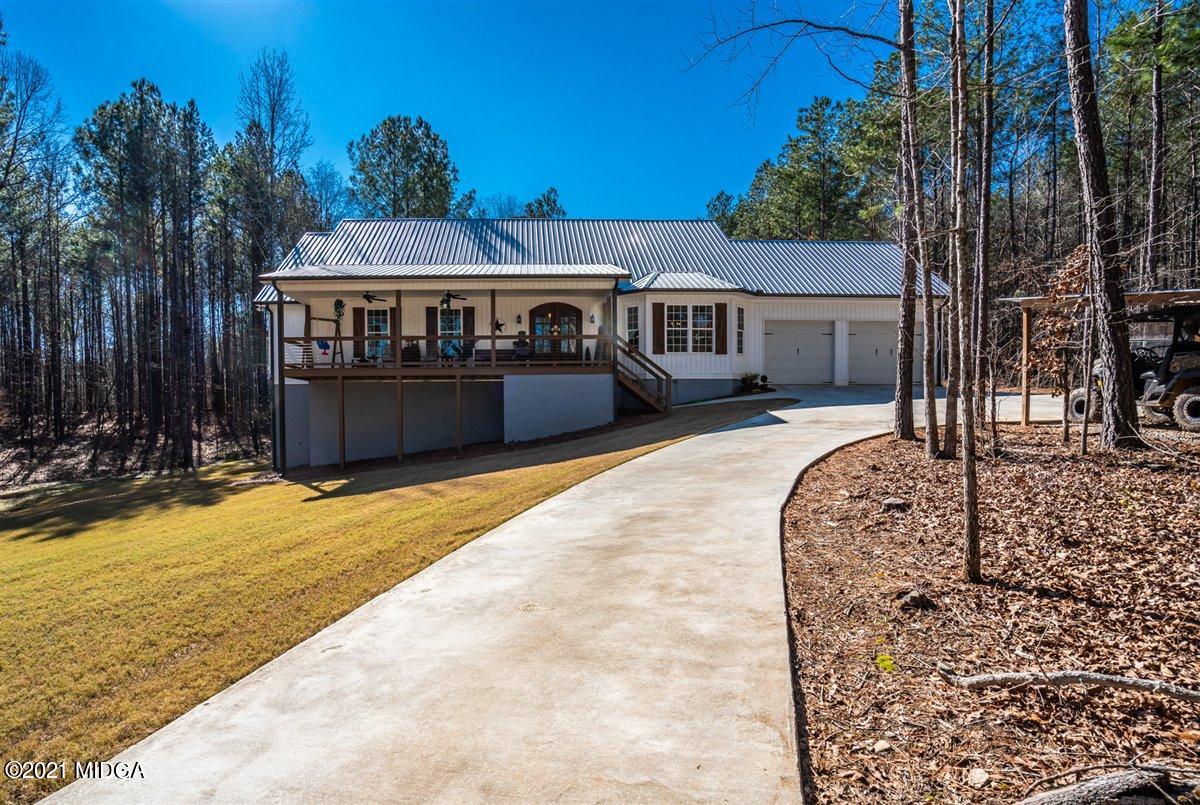 725 Taylor Road Juliette, GA 31046 - Photo 44 of 62 swimming pool view with a seating space