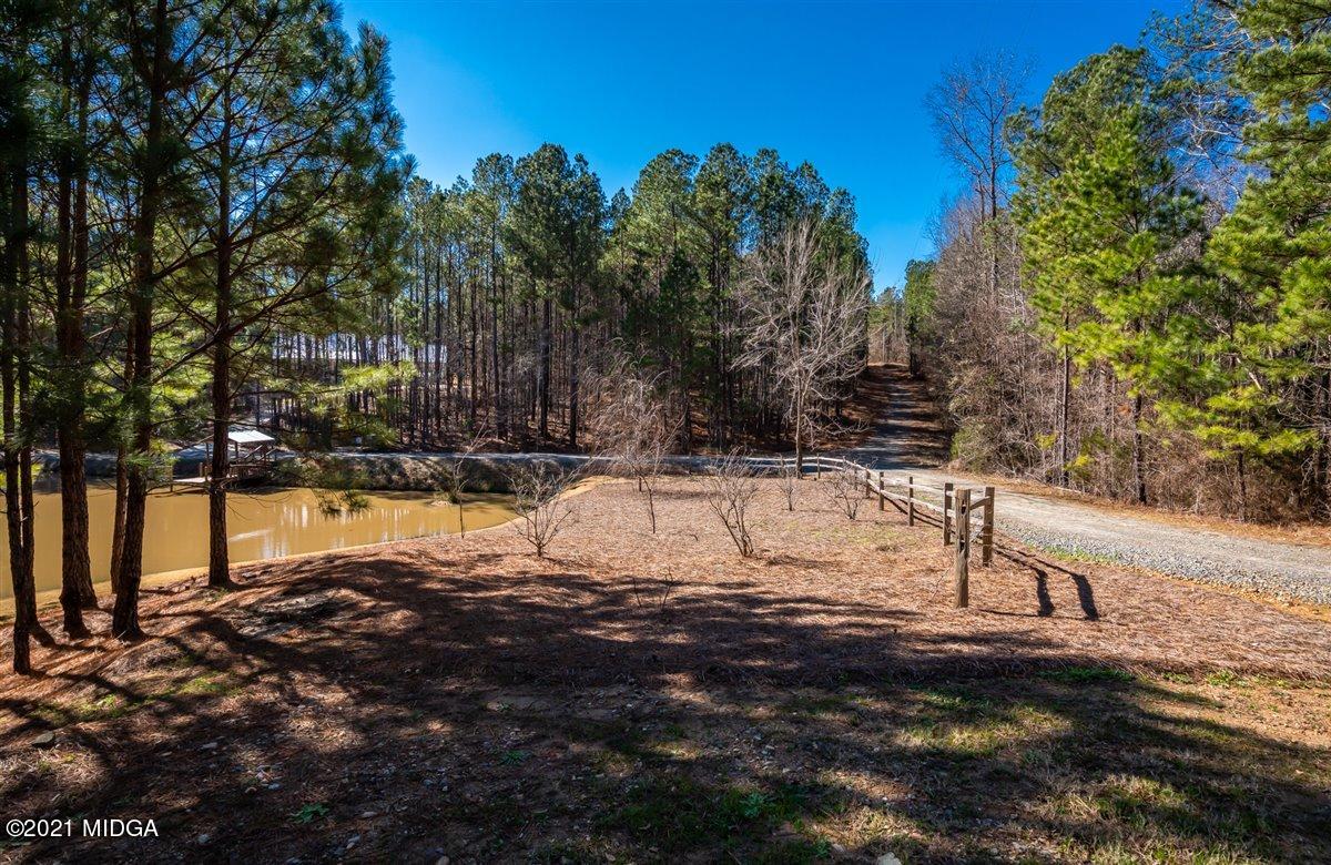 725 Taylor Road Juliette, GA 31046 - Photo 48 of 62 a view of swimming pool with a yard