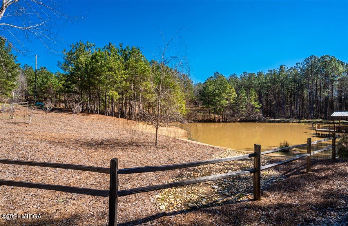 725 Taylor Road Juliette, GA 31046 - Photo 49 of 62 a view of a yard with an outdoor space