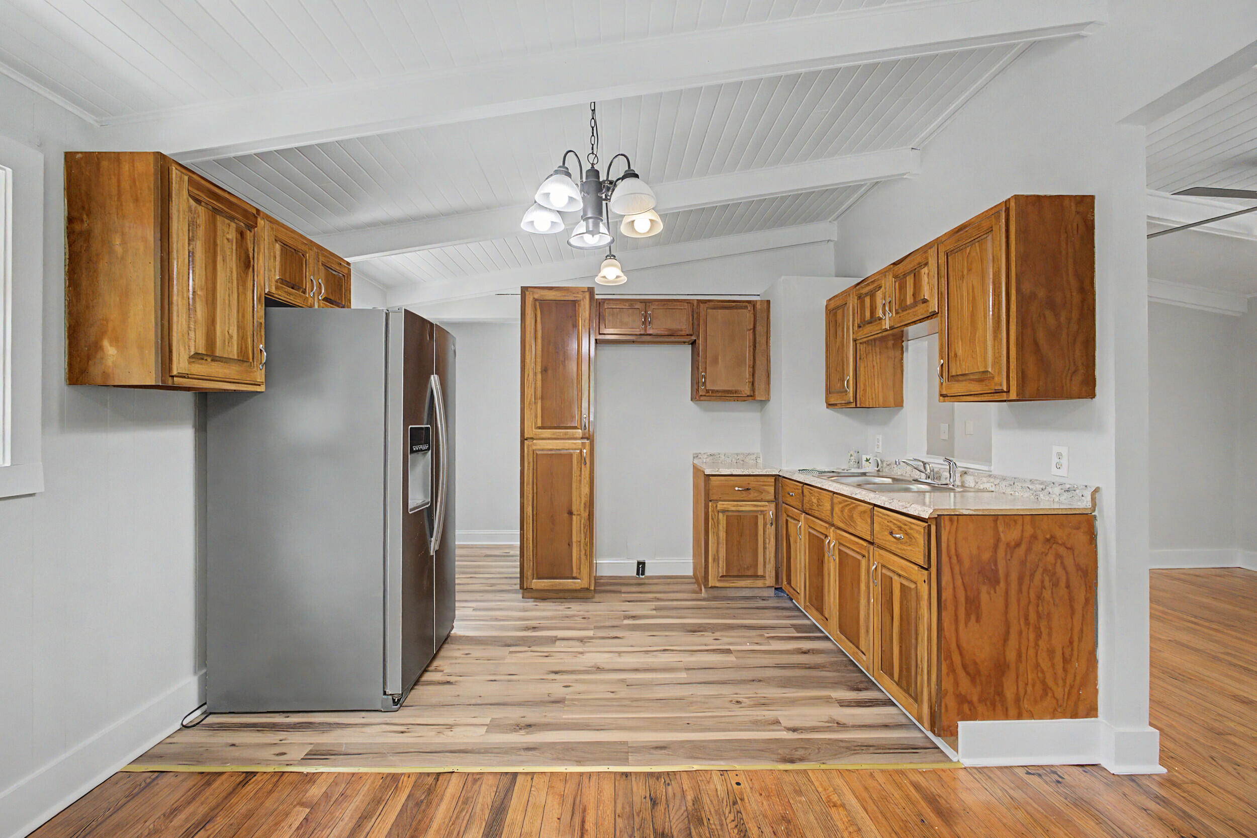 3016 Wagener Road Aiken, SC 29801 - Photo 12 of 29 a kitchen with stainless steel appliances granite countertop a refrigerator a sink dishwasher a stove with wooden cabinets and floor