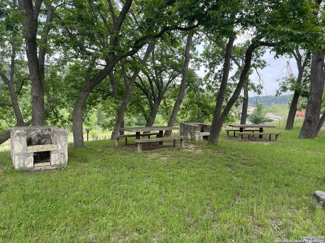a garden view with a sitting space