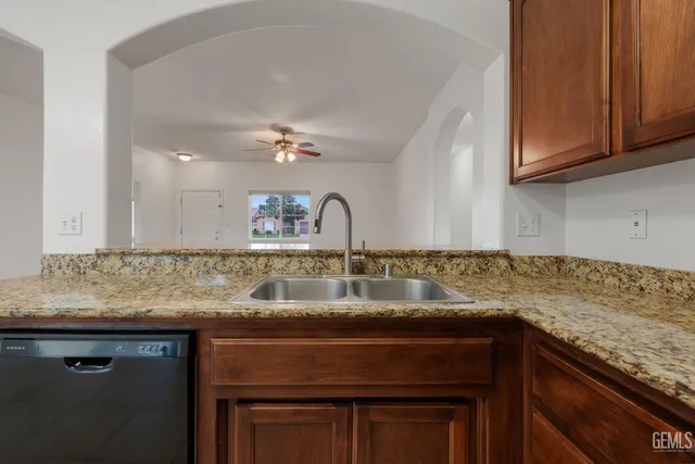 a bedroom with a bed couch and window