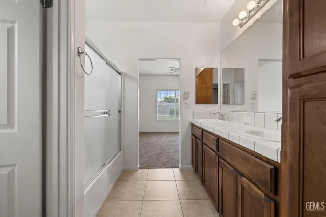 a bedroom with a bed furniture and a window