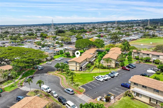 a picture of a book and a white bed