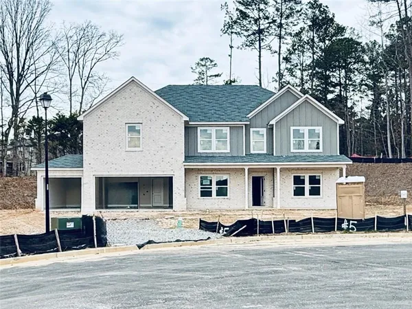 a view of a yard in front of a house