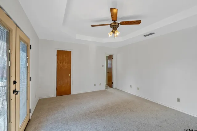 a view of an empty walk in closet