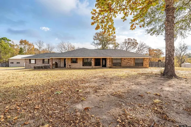 a view of a swimming pool with a backyard