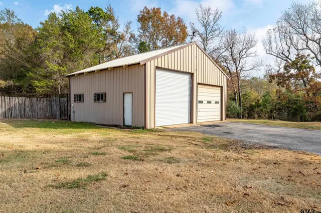 a view of empty room with windows