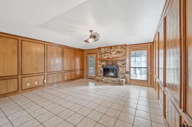 a view of house with outdoor space and swimming pool