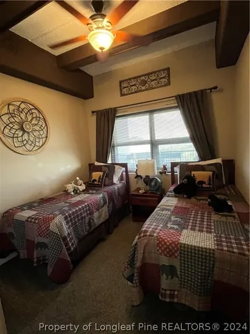 a room with furniture and chandelier