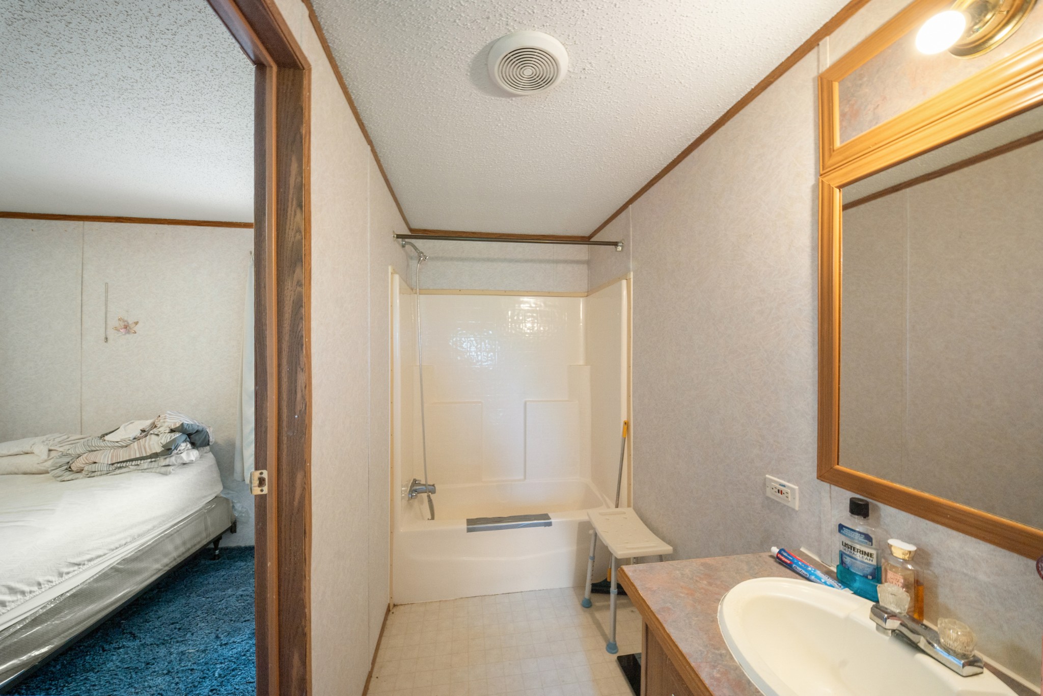 1777 Pond River Road Elkton, KY 42220 - Photo 17 of 21 a bathroom with a tub sink and mirror