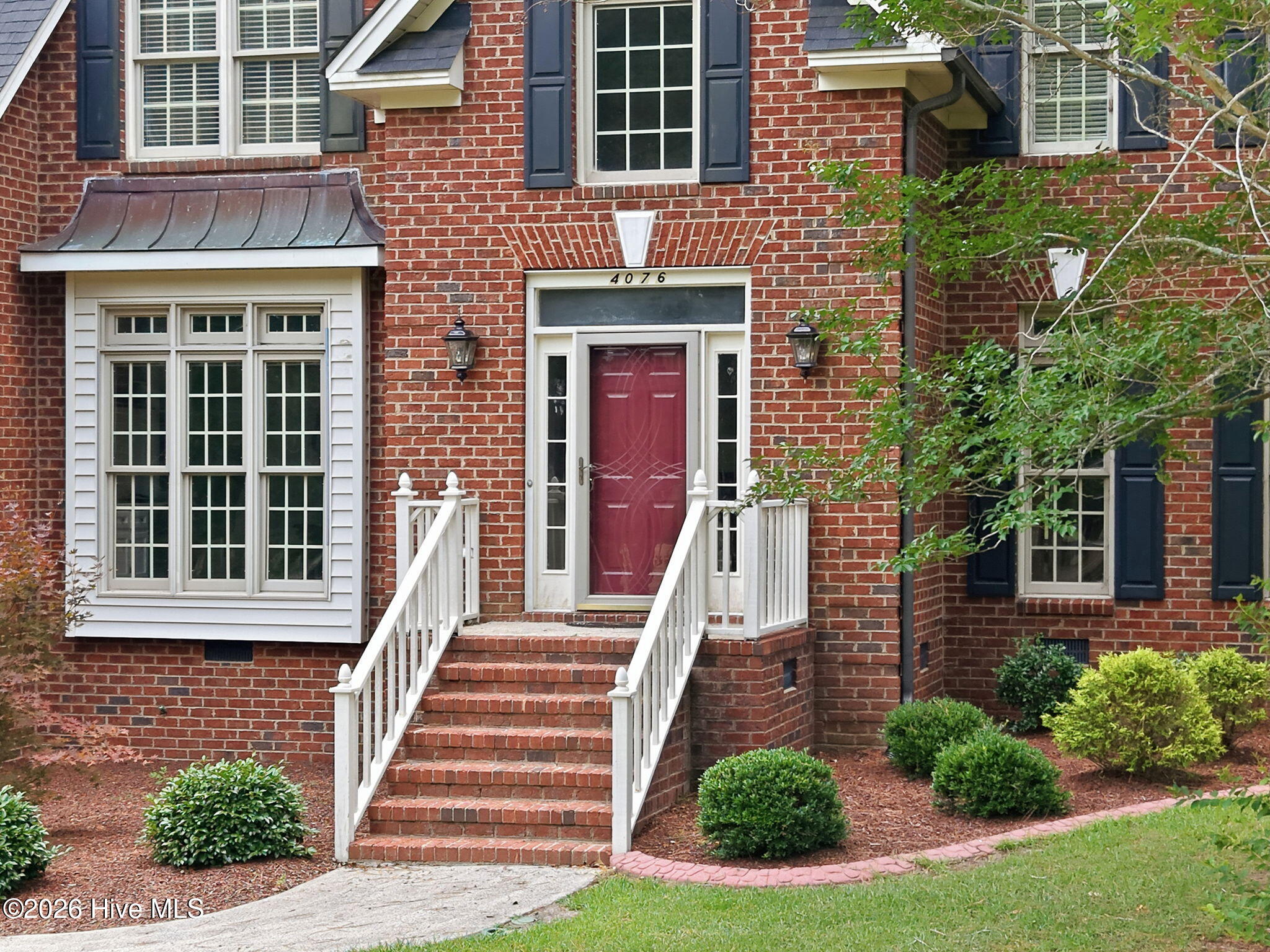 4076 Mobleys Bridge Road Grimesland, NC 27837 - Photo 4 of 66 front porch - this is true curb appeal from the second you come up the winding driveway