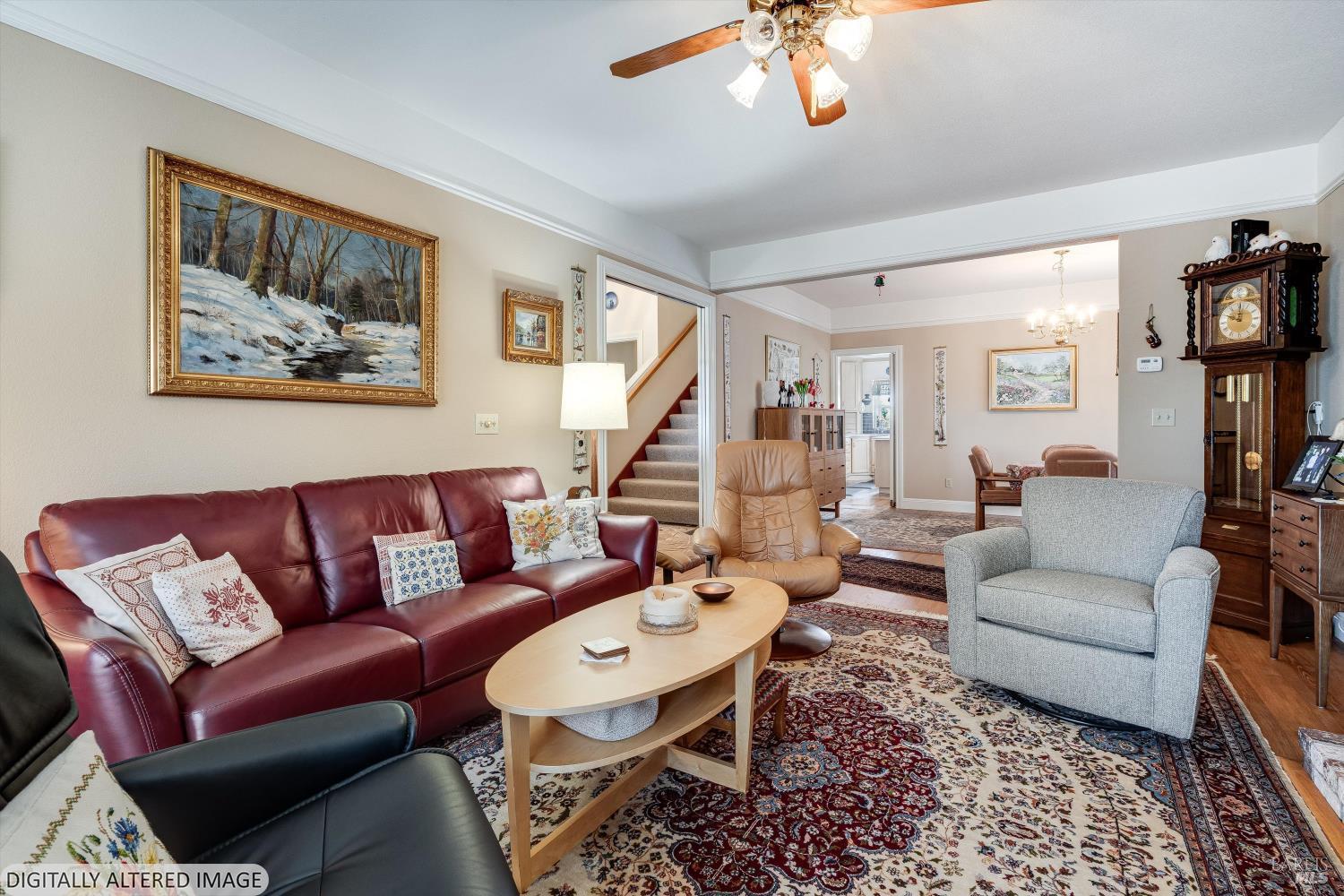 4760 Blank Road Sebastopol, CA 95472 - Photo 19 of 46 a living room with furniture a rug and a chandelier