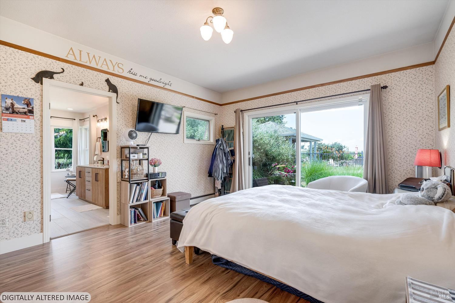 4760 Blank Road Sebastopol, CA 95472 - Photo 22 of 46 a bed room with a bed and a television
