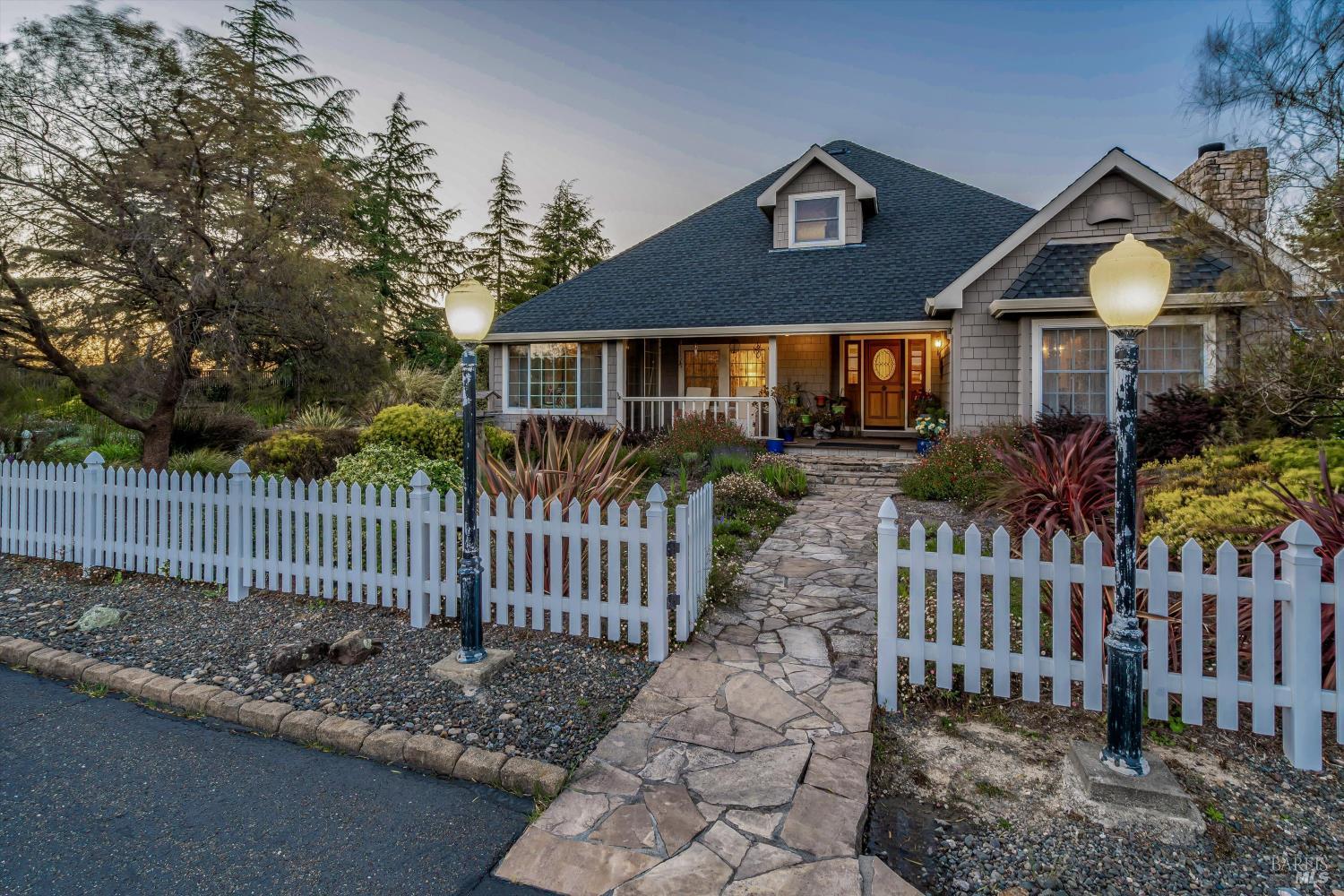 4760 Blank Road Sebastopol, CA 95472 - Photo 43 of 46 a front view of house with wooden fence