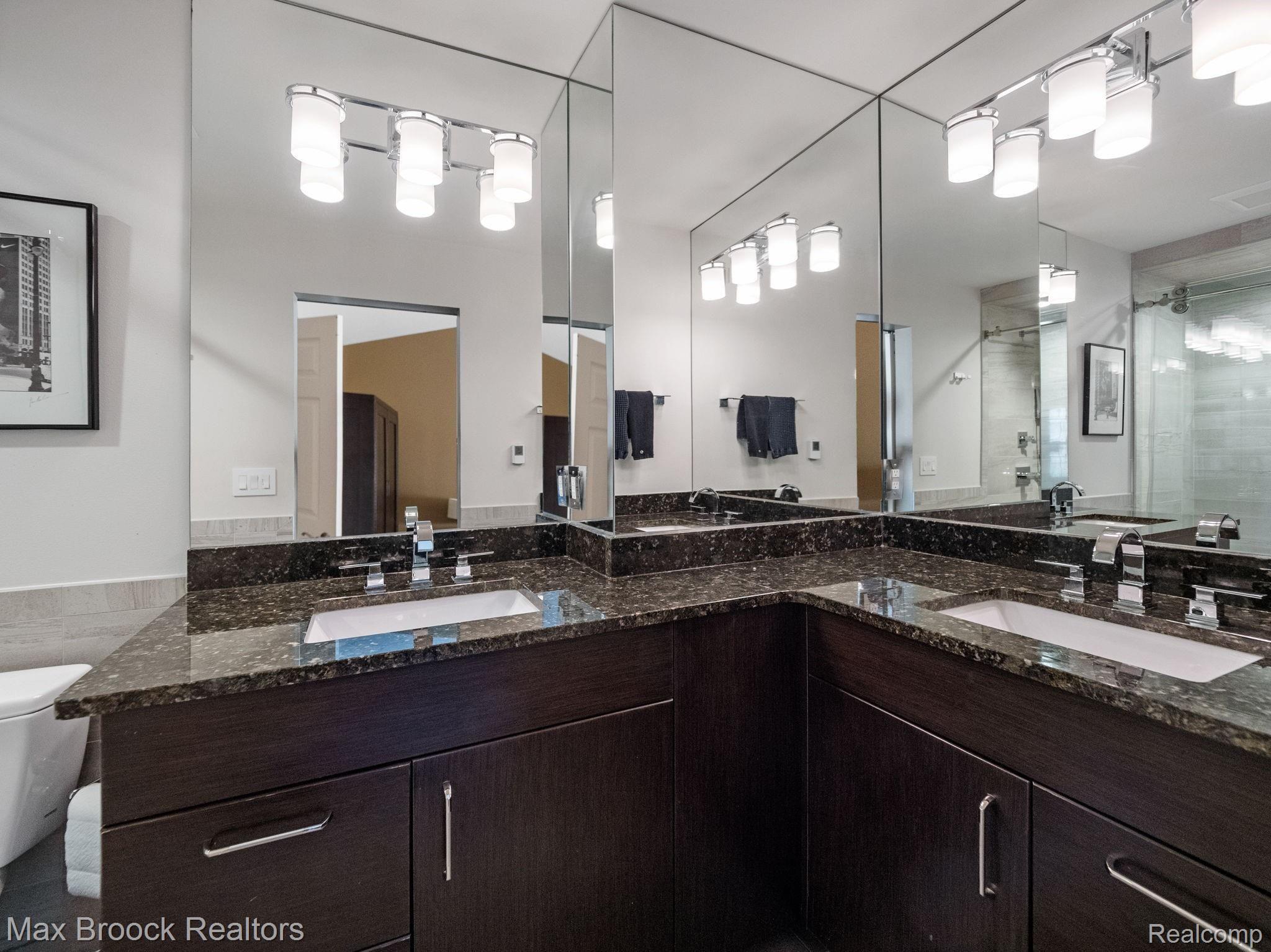 41491 Mitchell Road Novi, MI 48377 - Photo 11 of 28 Master bathroom with dual sinks, large walk-in shower and heated floors.