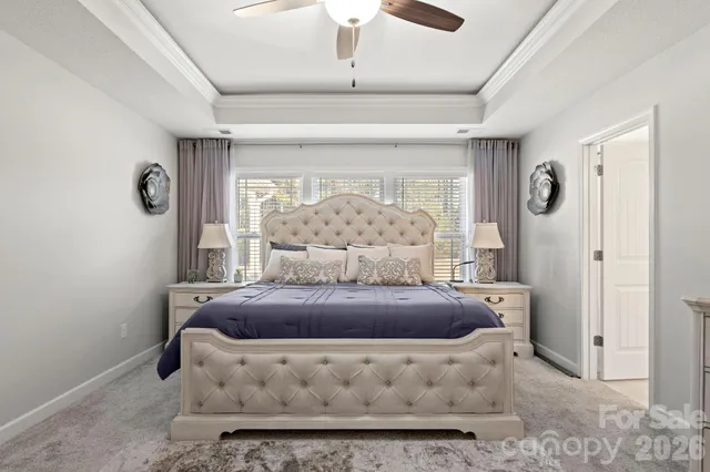 a room with furniture and a large window