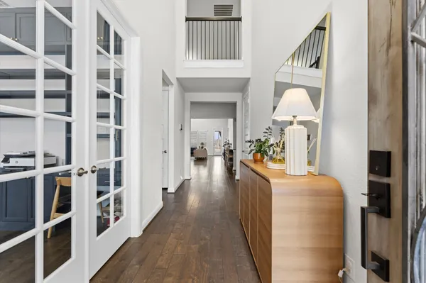 a view of a living room and entry way