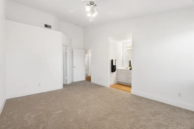 an empty room with a bathroom