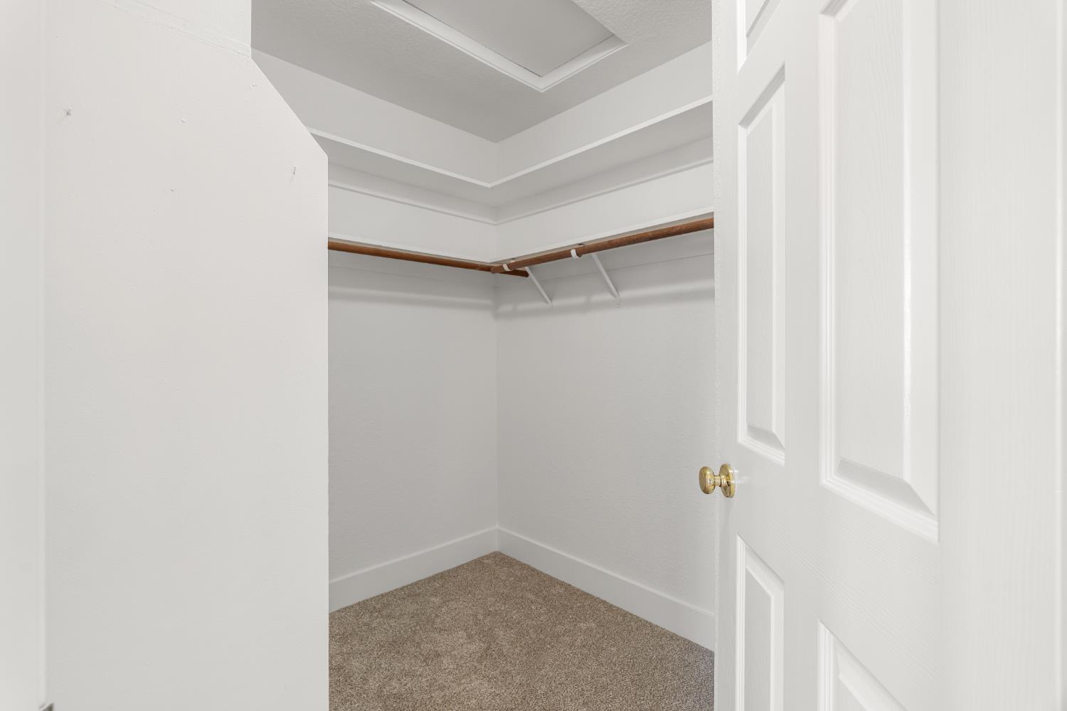 4730 Stuart Street Rocklin, CA 95765 - Photo 18 of 31 The primary bedroom has a generous sized walk-in closet.