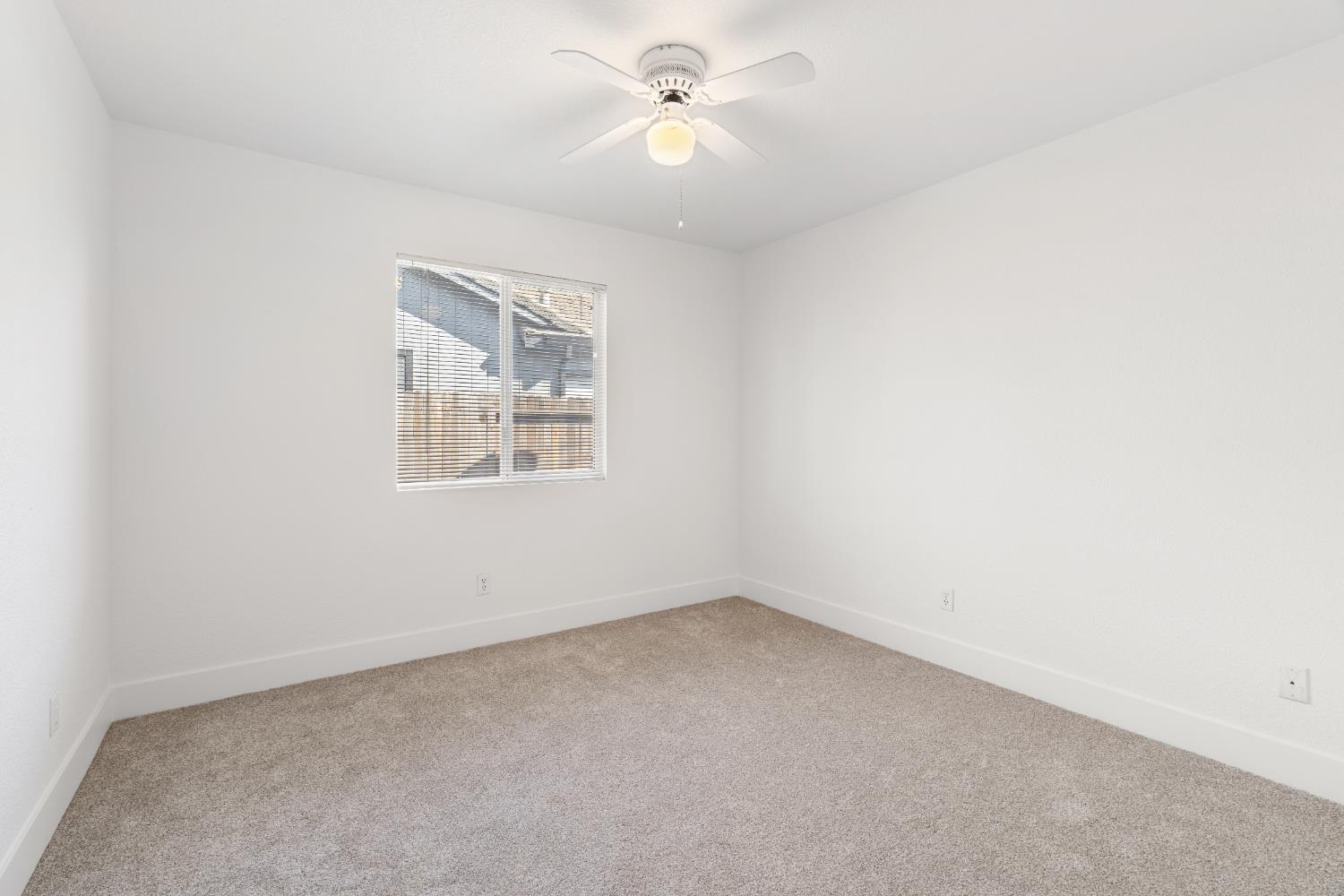 4730 Stuart Street Rocklin, CA 95765 - Photo 21 of 31 This is the 2nd bedroom and it is situated across the hall bathroom. It offers a walk-in closet. It has brand new plush carpet.