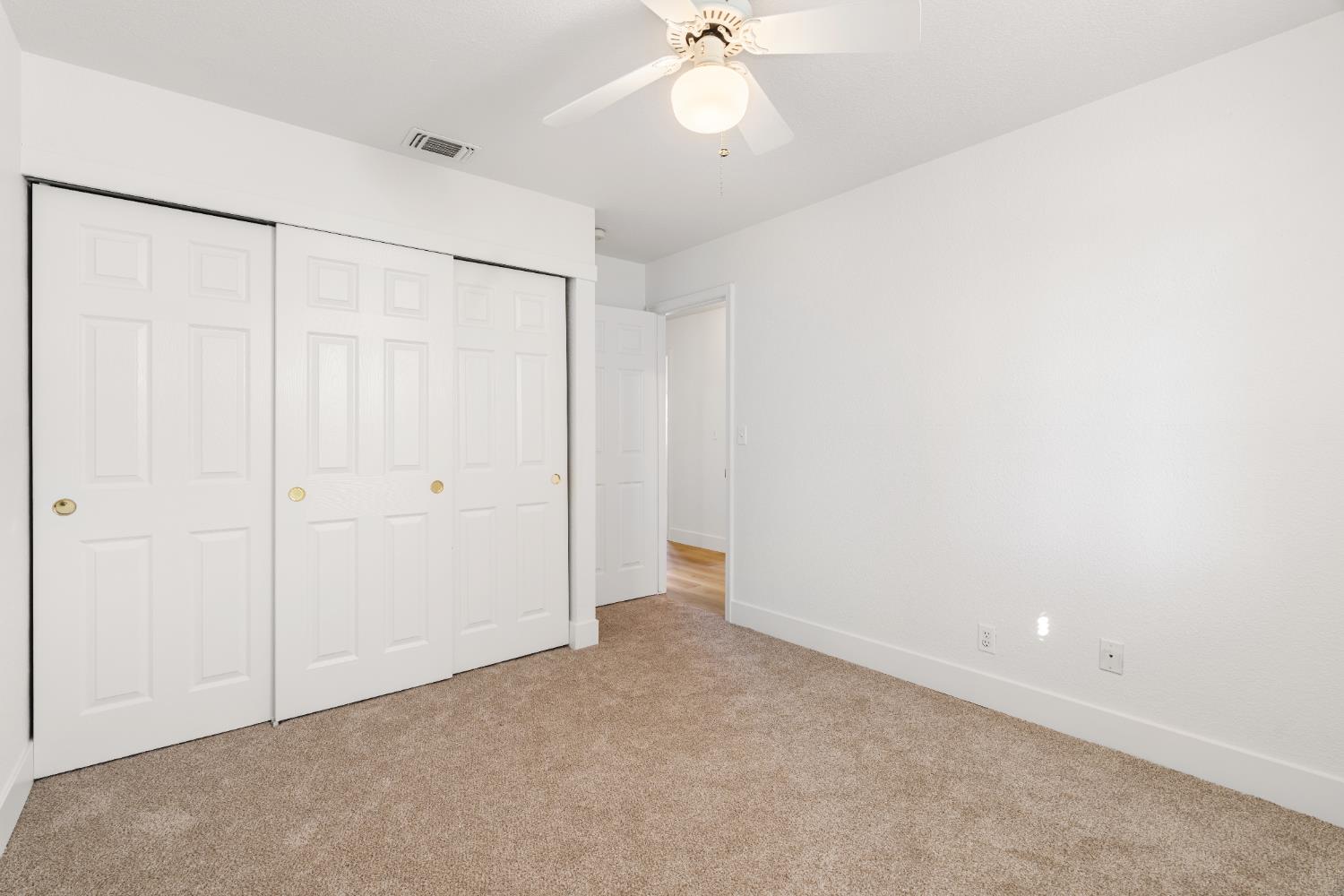 4730 Stuart Street Rocklin, CA 95765 - Photo 24 of 31 Brand new plush carpet has been installed in all 3 bedrooms. This bedroom has an expansive closet.