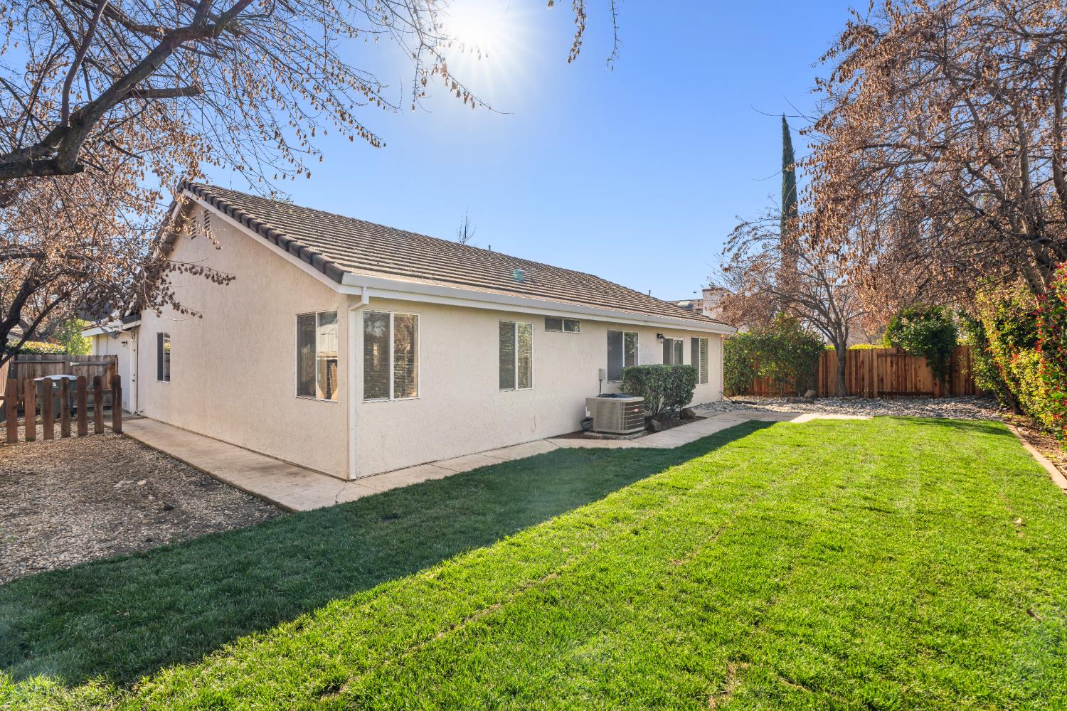 4730 Stuart Street Rocklin, CA 95765 - Photo 27 of 31 Enjoy this updated, private backyard with fresh sod and new drainage added.
