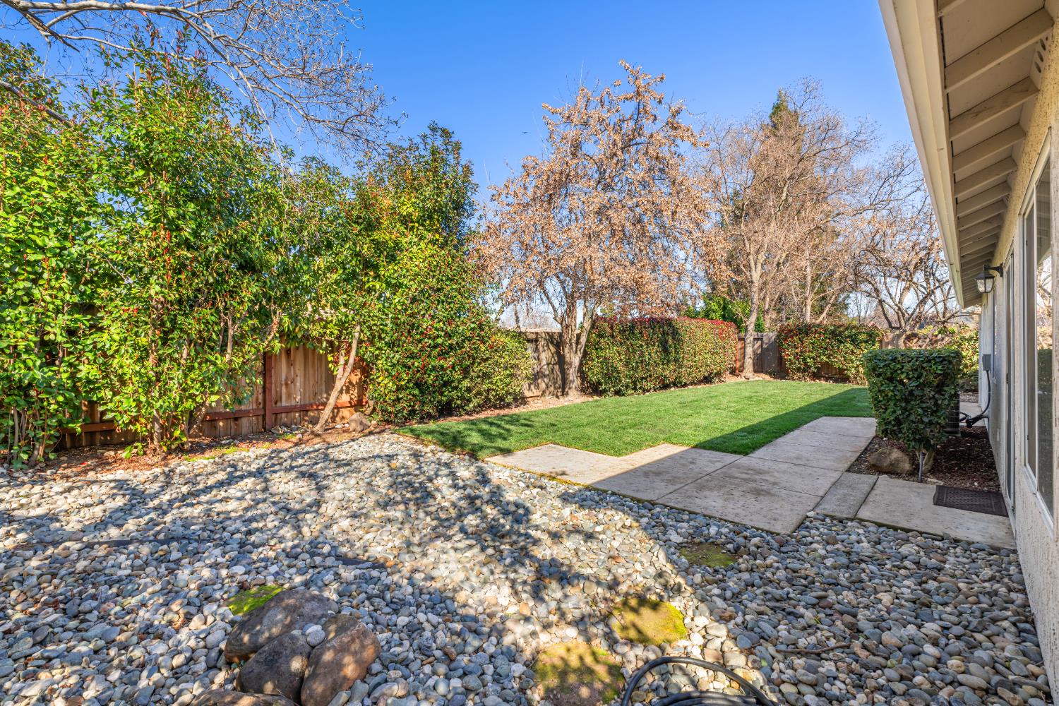 4730 Stuart Street Rocklin, CA 95765 - Photo 28 of 31 The mature landscaping adds to the alredy private backyard.