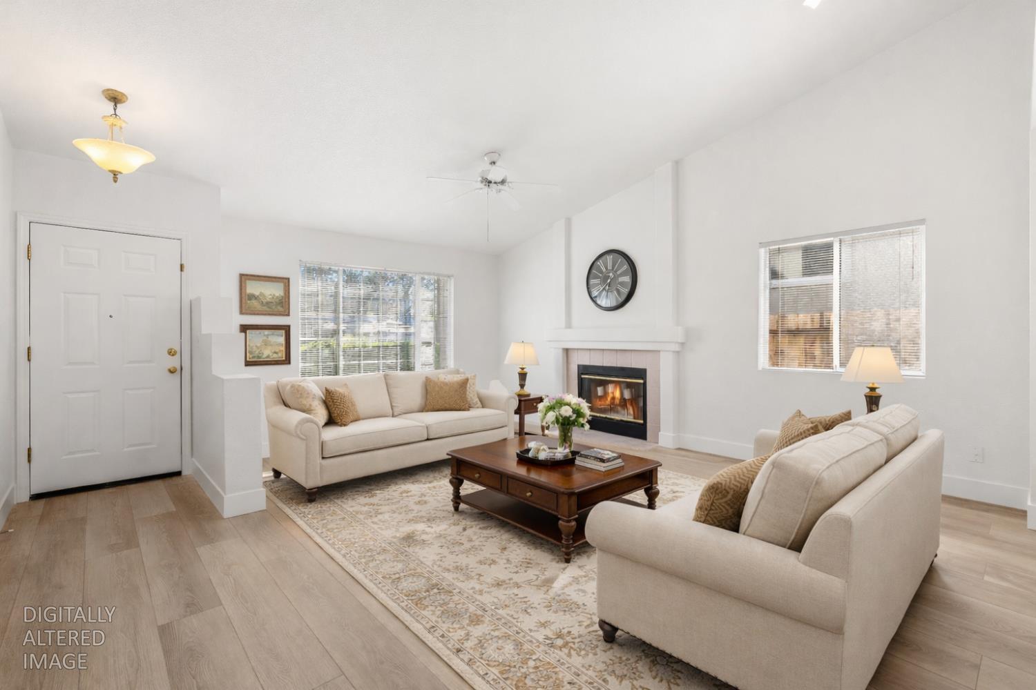 4730 Stuart Street Rocklin, CA 95765 - Photo 3 of 31 This photo has been virtually staged to show the spaciousness of the living room.