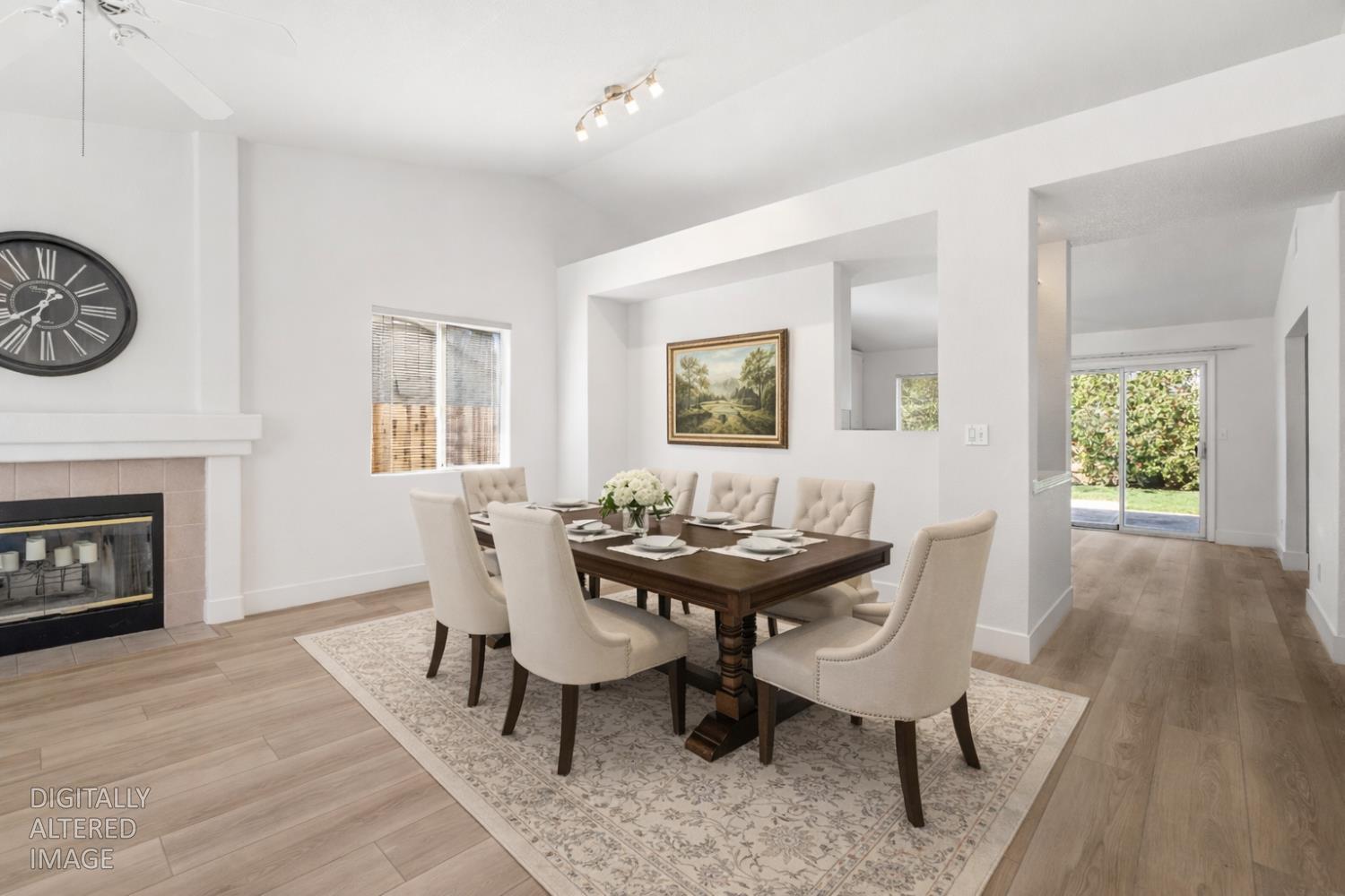 4730 Stuart Street Rocklin, CA 95765 - Photo 5 of 31 This photo has been virtually staged to show this space off the living room as a formal dining area. It could also be an extended living room area.