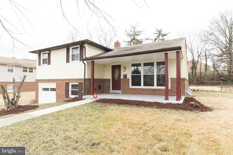 3405 Ripple Road Baltimore, MD 21244 - Photo 2 of 29 a view of a house with a large window and a yard