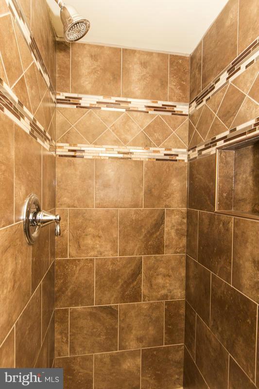 3405 Ripple Road Baltimore, MD 21244 - Photo 14 of 29 a bathroom with a shower
