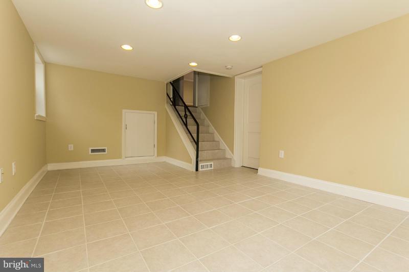 3405 Ripple Road Baltimore, MD 21244 - Photo 20 of 29 a view of an empty room with stairs