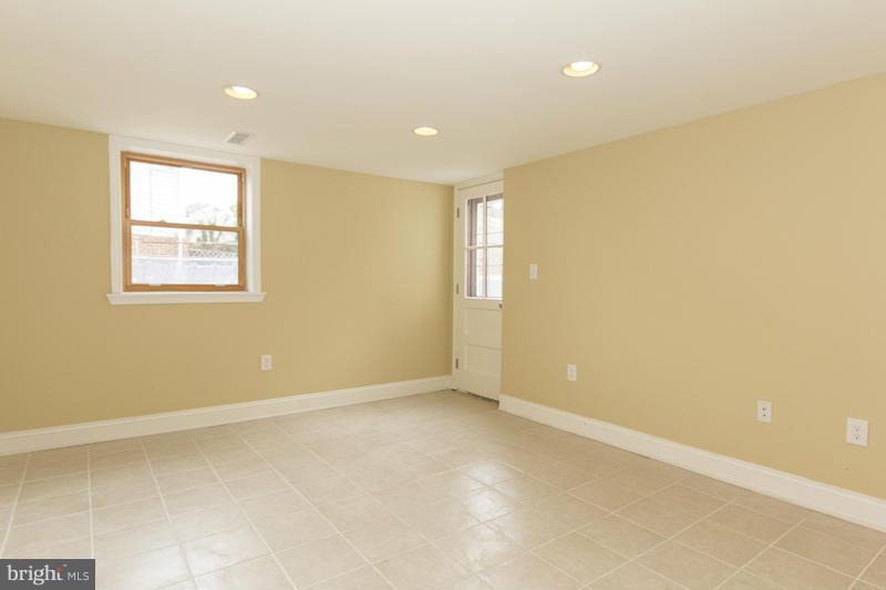3405 Ripple Road Baltimore, MD 21244 - Photo 21 of 29 a view of an empty room with a window