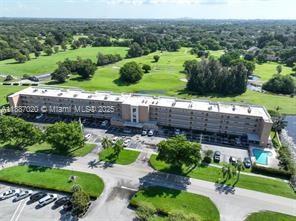 5100 Southwest 90th Avenue, Unit 203 Cooper City, FL 33328 - Photo 1 of 18 an aerial view of a house with a garden