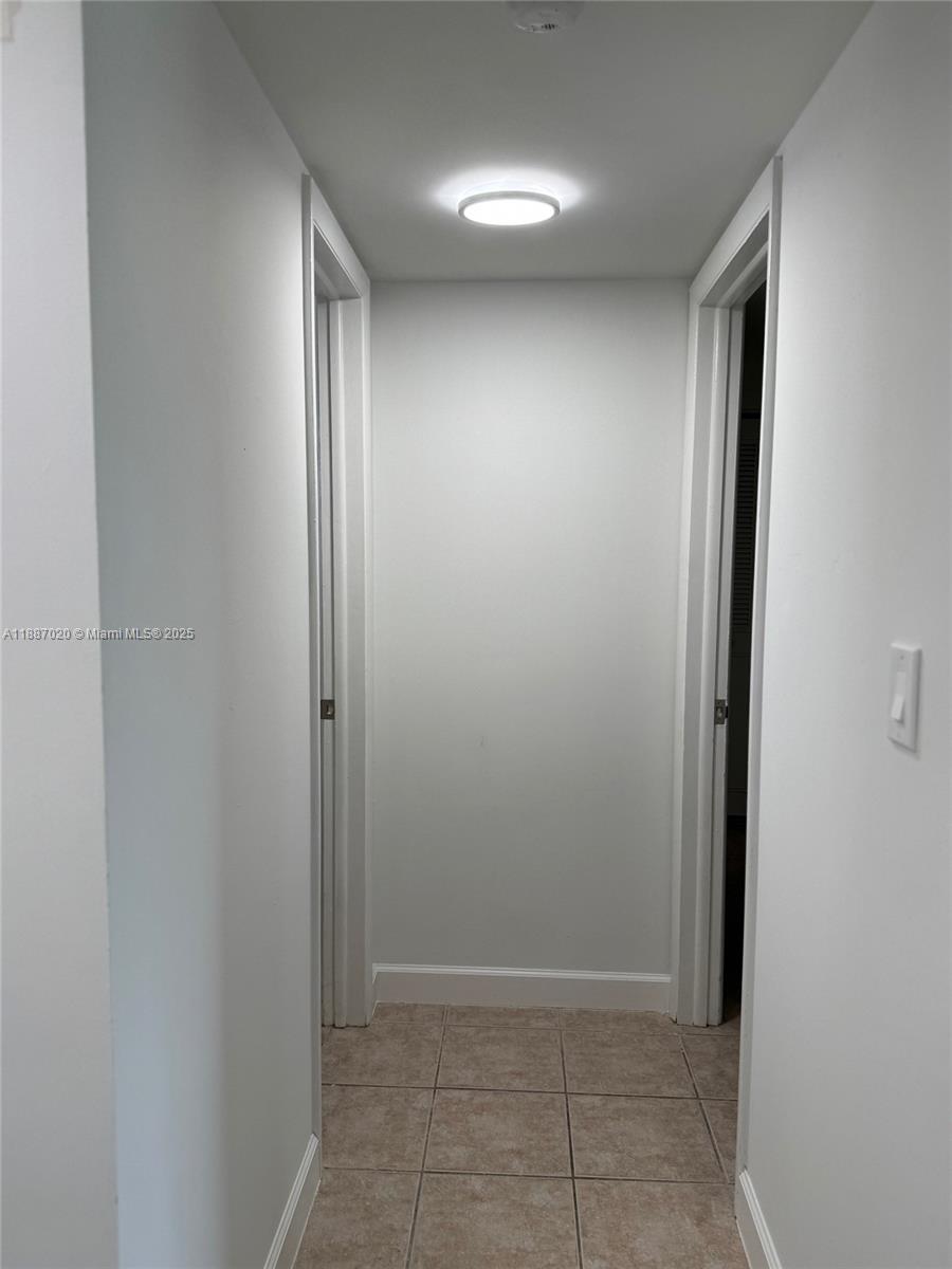 5100 Southwest 90th Avenue, Unit 203 Cooper City, FL 33328 - Photo 13 of 18 an empty room with closet