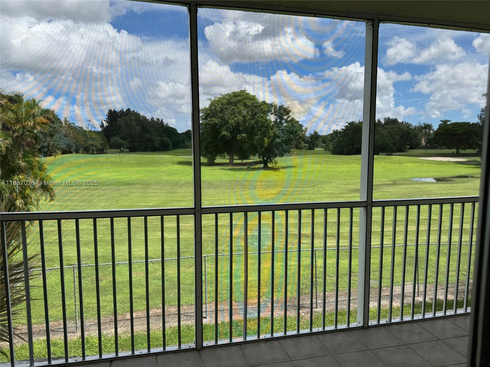 5100 Southwest 90th Avenue, Unit 203 Cooper City, FL 33328 - Photo 17 of 18 a view of an outdoor space with a lake view