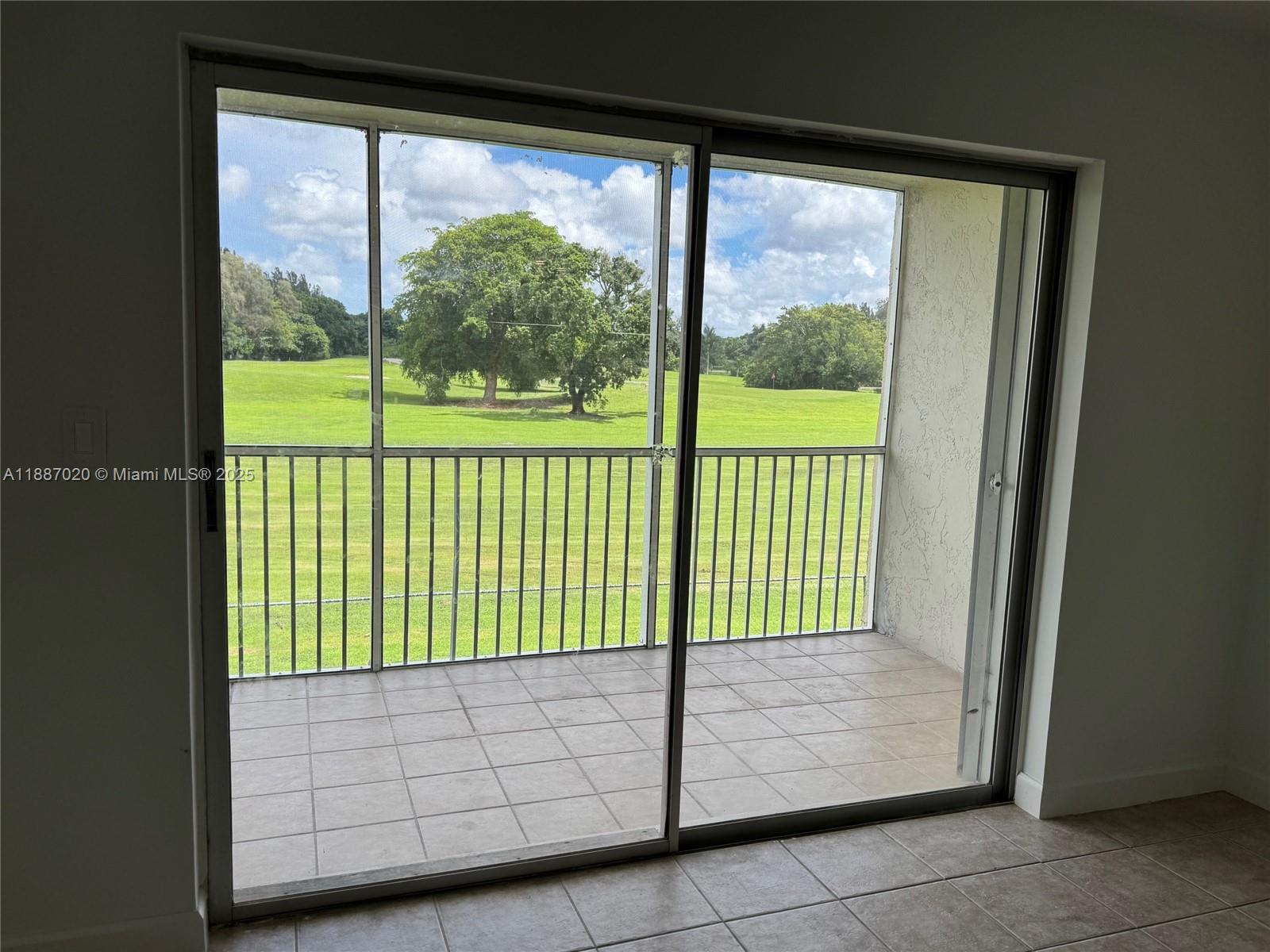 5100 Southwest 90th Avenue, Unit 203 Cooper City, FL 33328 - Photo 18 of 18 a view of a room with wooden floor