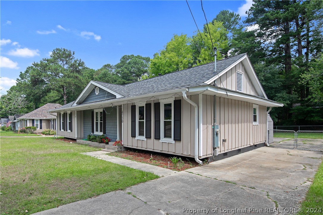 4730 Belford Road Fayetteville, NC 28314 - Photo 2 of 47 a view of a house with a yard