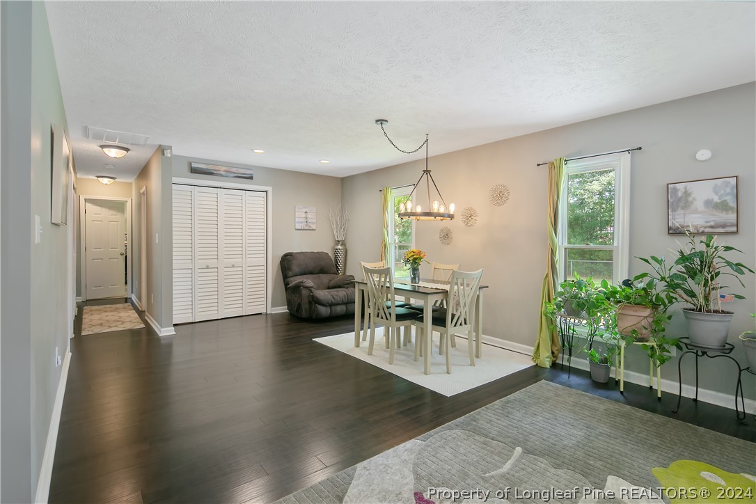 4730 Belford Road Fayetteville, NC 28314 - Photo 22 of 47 a view of a livingroom with furniture and a potted plant