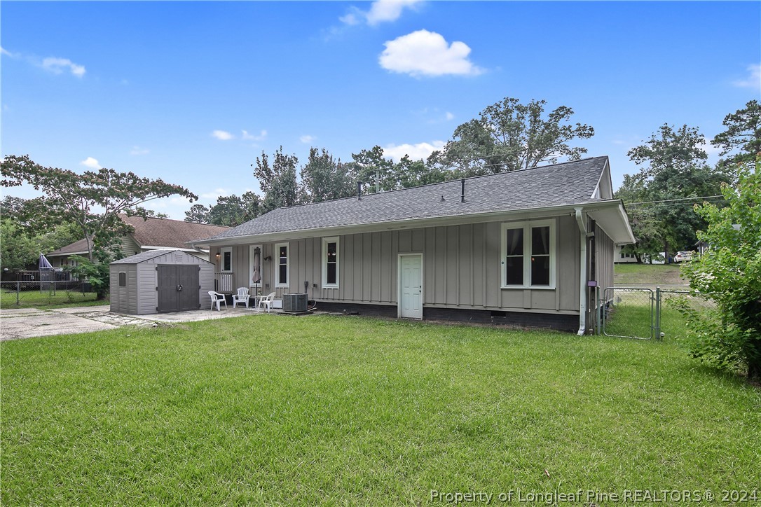 4730 Belford Road Fayetteville, NC 28314 - Photo 45 of 47 a view of a house with a yard and sitting area