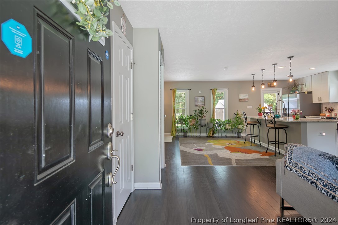 4730 Belford Road Fayetteville, NC 28314 - Photo 5 of 47 a view of a living room and chandelier