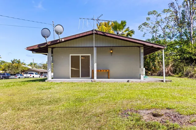 a view of balcony with wooden floor and outdoor seating