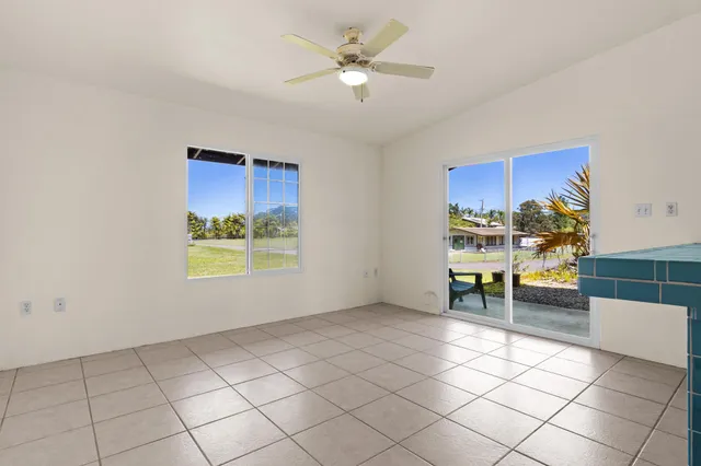 a kitchen with stainless steel appliances granite countertop a refrigerator a stove and a sink