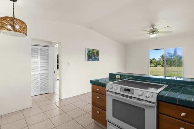 an empty room with a mirror