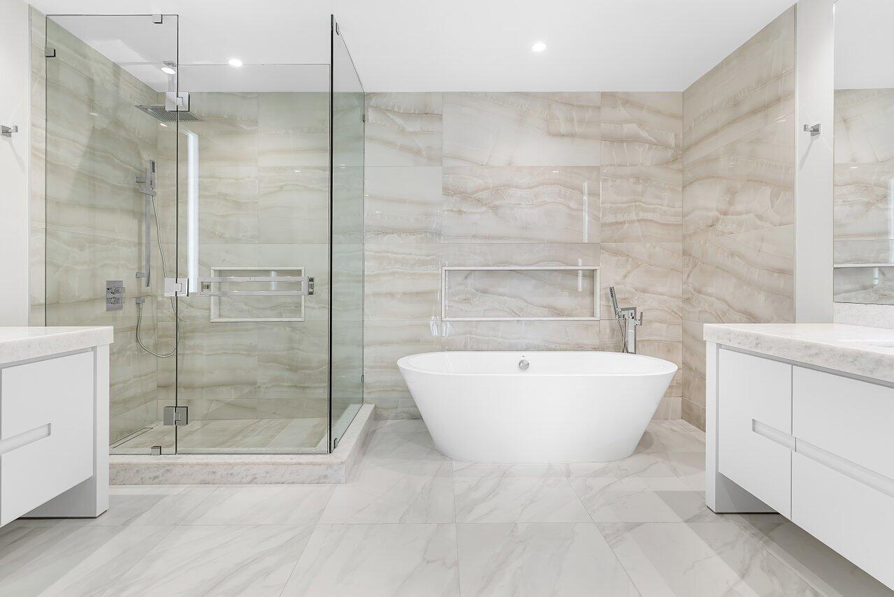 220 Southeast Mizner Boulevard, Unit 506 Boca Raton, FL 33432 - Photo 25 of 64 a bathroom with a bathtub and shower