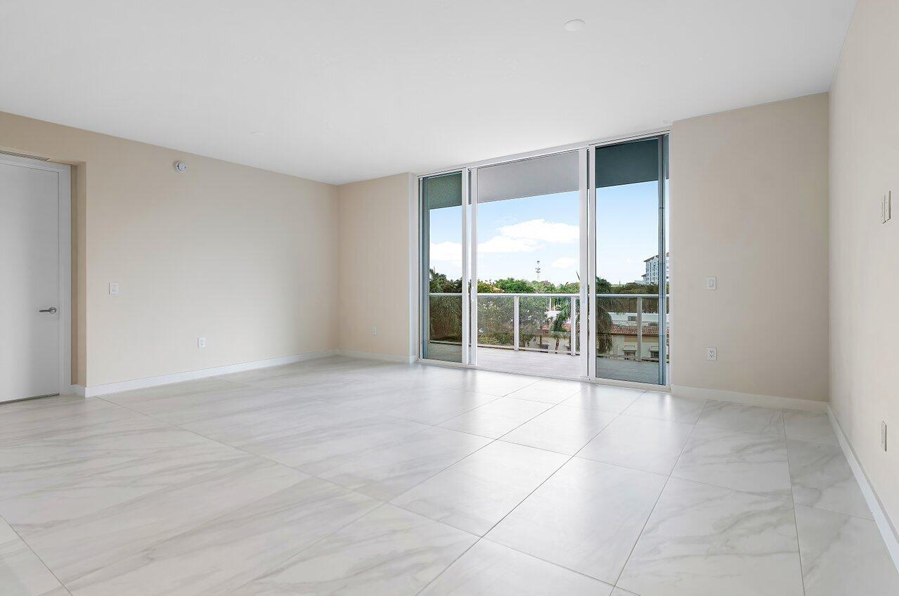 220 Southeast Mizner Boulevard, Unit 506 Boca Raton, FL 33432 - Photo 30 of 64 a view of an empty room with a window