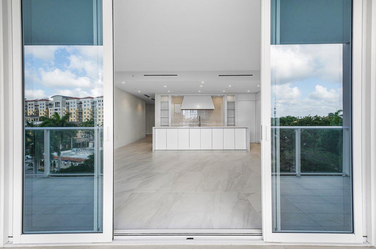 220 Southeast Mizner Boulevard, Unit 506 Boca Raton, FL 33432 - Photo 32 of 64 a view of a living room and a window